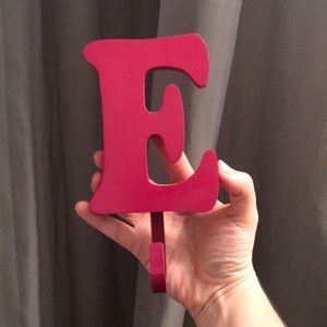 An “E” jewelry/hand towel hanger!